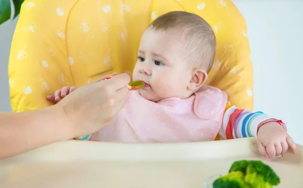 Little Baby Eating Broccoli Vegetable Puree Selective Focus People — Stock Photo, Image