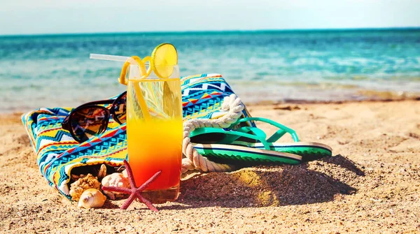 Beach background with a cocktail by the sea. Selective focus. nature.