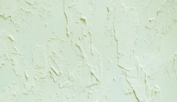 Duvarda dekoratif macun örneği var. Ev tamiri. Seçici odaklanma. Renk.