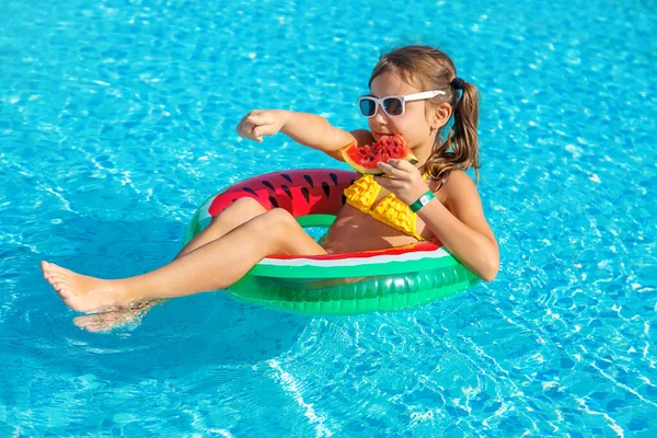 Child Girl Eats Watermelon Pool Selective Focus Kid —  Fotos de Stock
