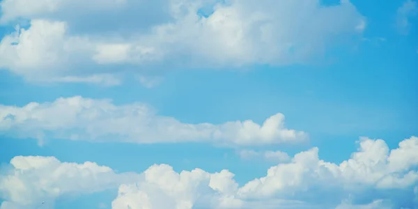 White clouds in the sky. Selective focus. Nature.