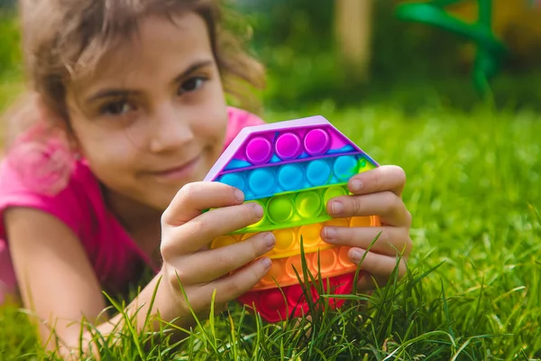 Colorful Antistress Sensory Toy Fidget Push Pop Child Hands Selective — Stock Photo, Image