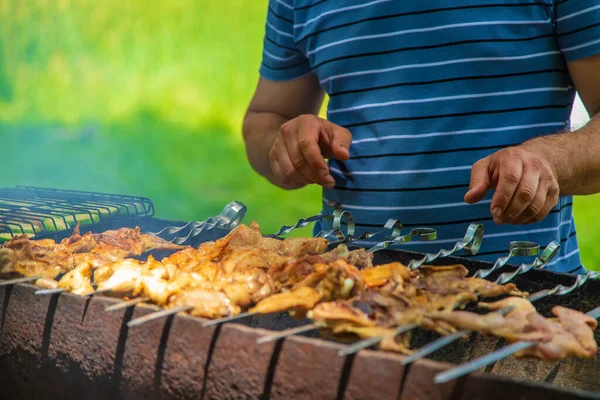 Man Roasts Meat Fire Selective Focus Food — Stock Photo, Image
