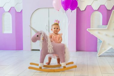 The first year of the baby is a photo session. Selective focus. Child.