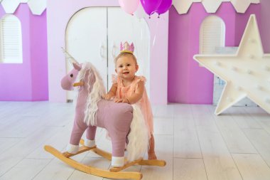 The first year of the baby is a photo session. Selective focus. Child.