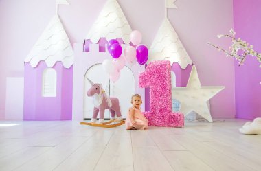 The first year of the baby is a photo session. Selective focus. Child.