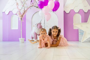 The first year of the baby is a photo session. Selective focus. Child.