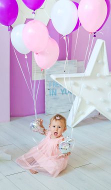 The first year of the baby is a photo session. Selective focus. Child.