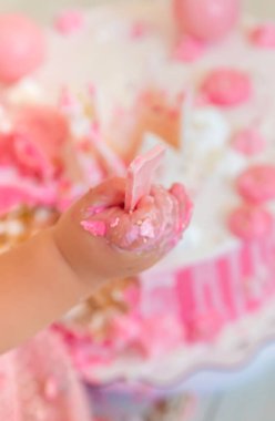 The first year of the baby is a cake. Selective focus. Child.