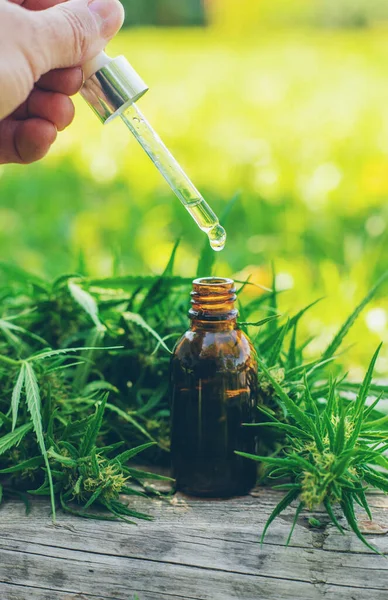 Cannabis supplements and homeopathy. Selective focus. Nature.