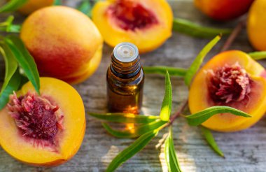 Peach kernel oil and supplements. Selective focus. nature.