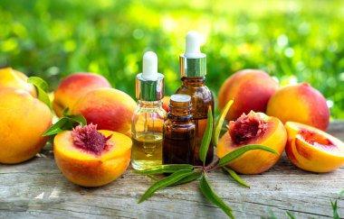 Peach kernel oil and supplements. Selective focus. nature.