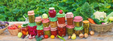 Jars with preserved vegetables for the winter. Selective focus. Food.
