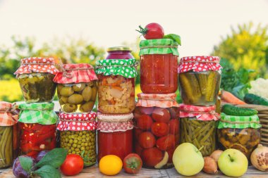 Jars with preserved vegetables for the winter. Selective focus. Food.