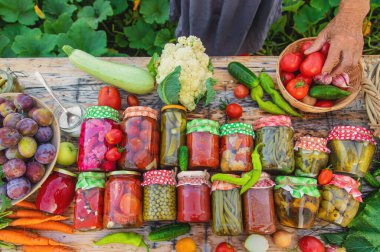 Jars with preserved vegetables for the winter. Selective focus. Food.