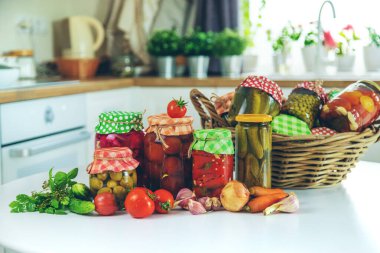 Jars with preserved vegetables for the winter. Selective focus. Food.
