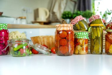 Jars with preserved vegetables for the winter. Selective focus. Food.