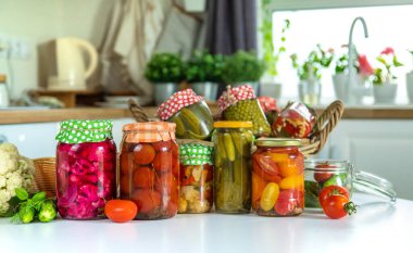 Jars with preserved vegetables for the winter. Selective focus. Food.