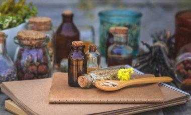 Medicinal herbs and tinctures homeopathy. Selective focus. Nature.