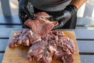 A man cutting meat. Selective focus. Food.