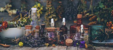 Medicinal herbs and tinctures homeopathy. Selective focus. Nature.