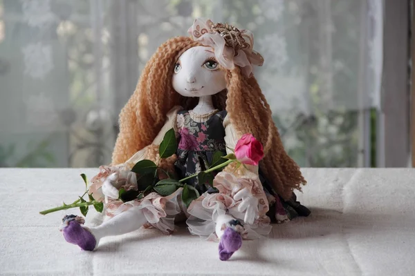 Doll with long hair and a rose — Stock Photo, Image