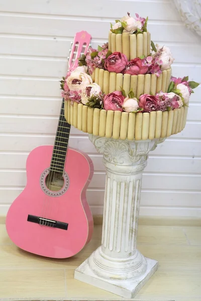 cake from sponge biscuits and guitar