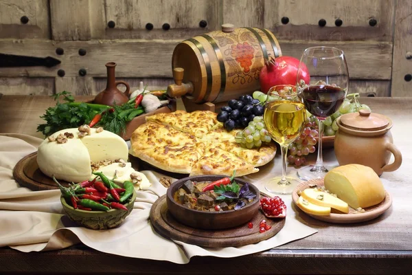 Wine with cheese and fruit and meat with hot pepper — Stock Photo, Image