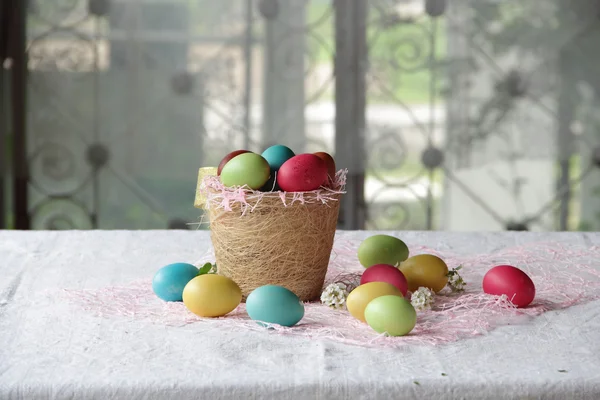 Easter eggs in a basket — Stock Photo, Image