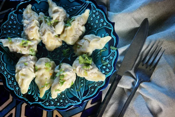 Azerbaijani dumplings, made of cooked dough with meat — Stock Photo, Image