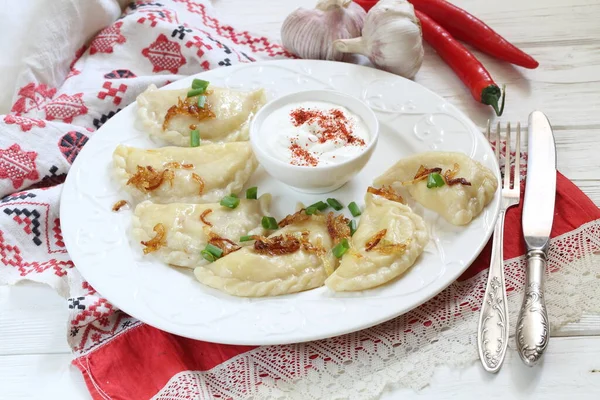 Dumplings Potatoes Green Onions Sour Cream — Stock Photo, Image