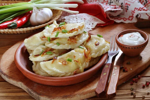 Dumplings Potatoes Green Onions Sour Cream — Stock Photo, Image