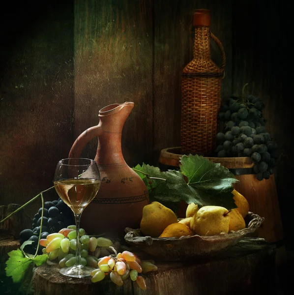 Still-life with wine, pears and grapes — Stock Photo, Image