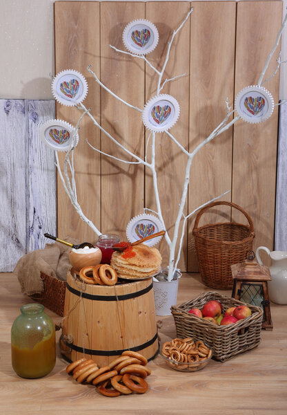 Pancakes with red caviar, sour cream, a crimson berry juice and 