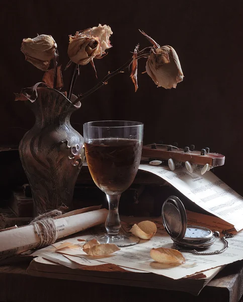 Wine, faded flowers and pocket watch — Stock Photo, Image