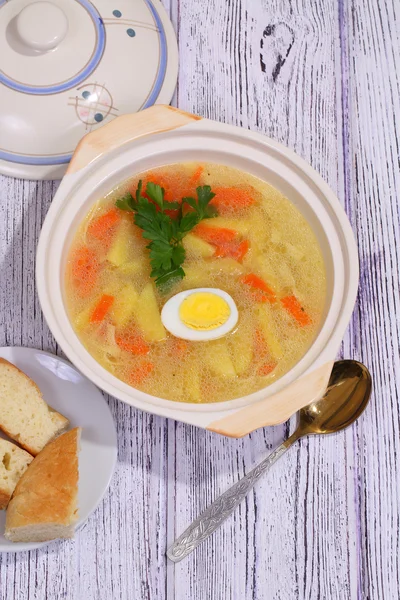 Chicken soup with house noodles and boiled egg — Stock Photo, Image