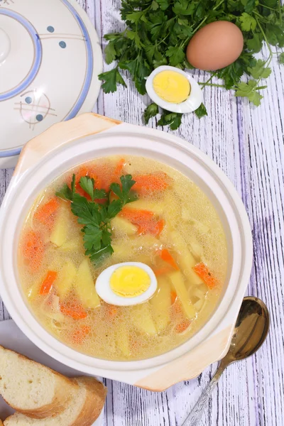 Chicken soup with noodles and egg — Stock Photo, Image