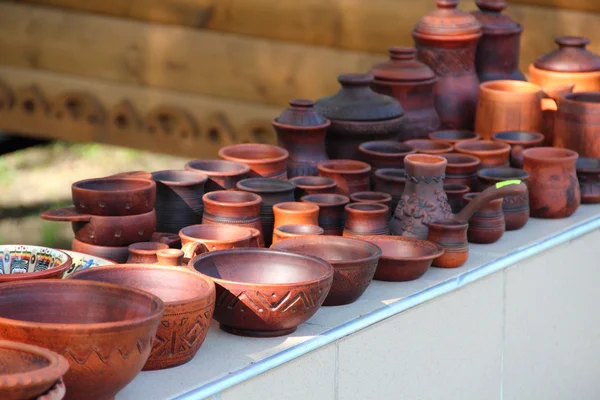 Ceramic brown bowl among ceramic ware — Stock Photo, Image