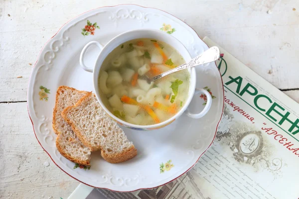 Soup with macaroni and vegetables submitted to a soup tureen and — Stock Photo, Image