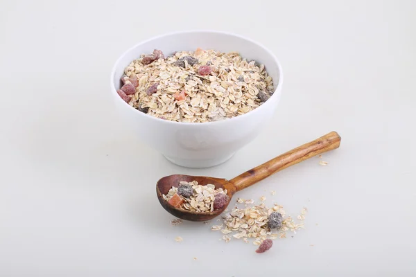 Porridge with dried fruits and nuts — Stock Photo, Image