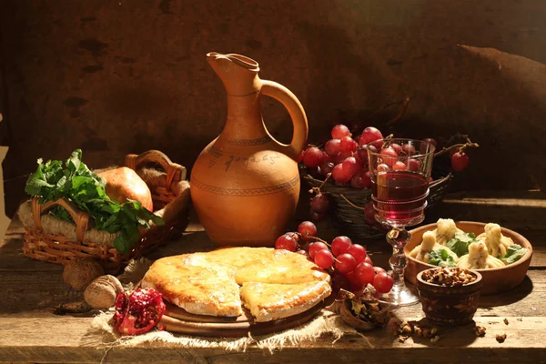 Wine, grapes and pie with a cheese stuffing — Stock Photo, Image