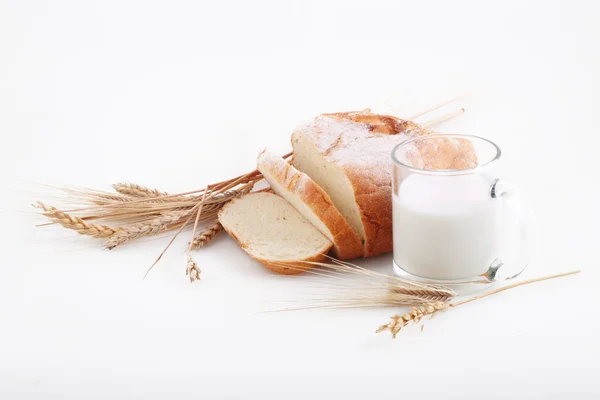 Rich bread and milk in a transparent glass — Stock Photo, Image