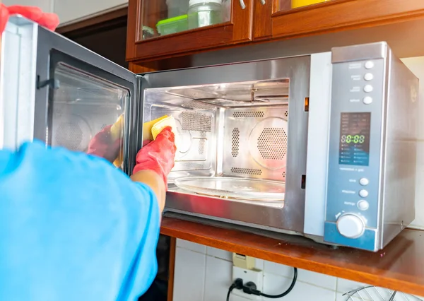 Close Woman Cleaning Microwave Oven Sponge Kitchen — Stock Photo, Image