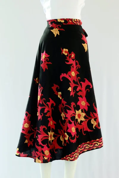 Casual women\'s skirt with a length to the calf with a batik floral motif looks beautiful.