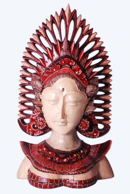 Geleneksel giyimli Balili kadın figürlerin iç dekorasyon nesneleri üzerine batik uygulaması.