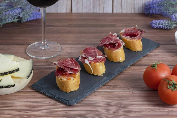 Bread Spanish Iberian Ham Accompanied Glass Wine Olives Cheese — Stock Photo, Image