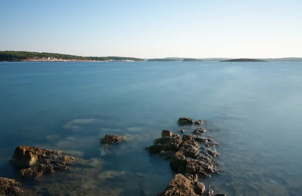 Rocky coast after  sunrise in the summer morning in Croatia — Stock Photo, Image