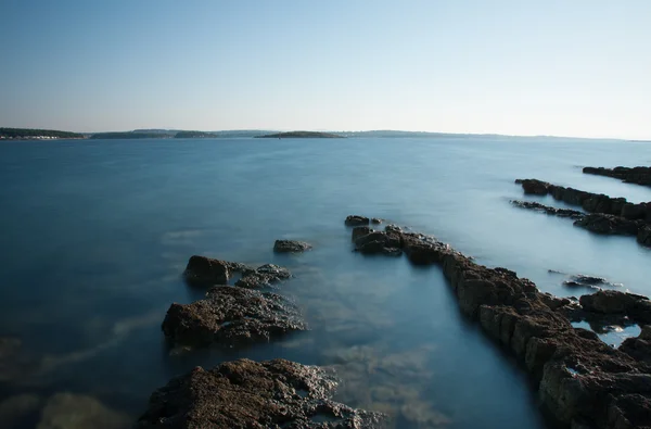 Rocky coast after  sunrise in the summer morning in Croatia — Stock Photo, Image