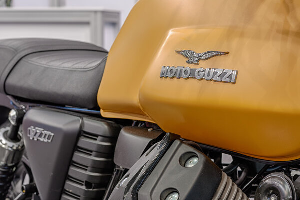 Close up of inscription on fuel tank of motorcycle Moto Guzzi V7