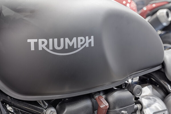 Close up of inscription on fuel tank of motorcycle Triumph